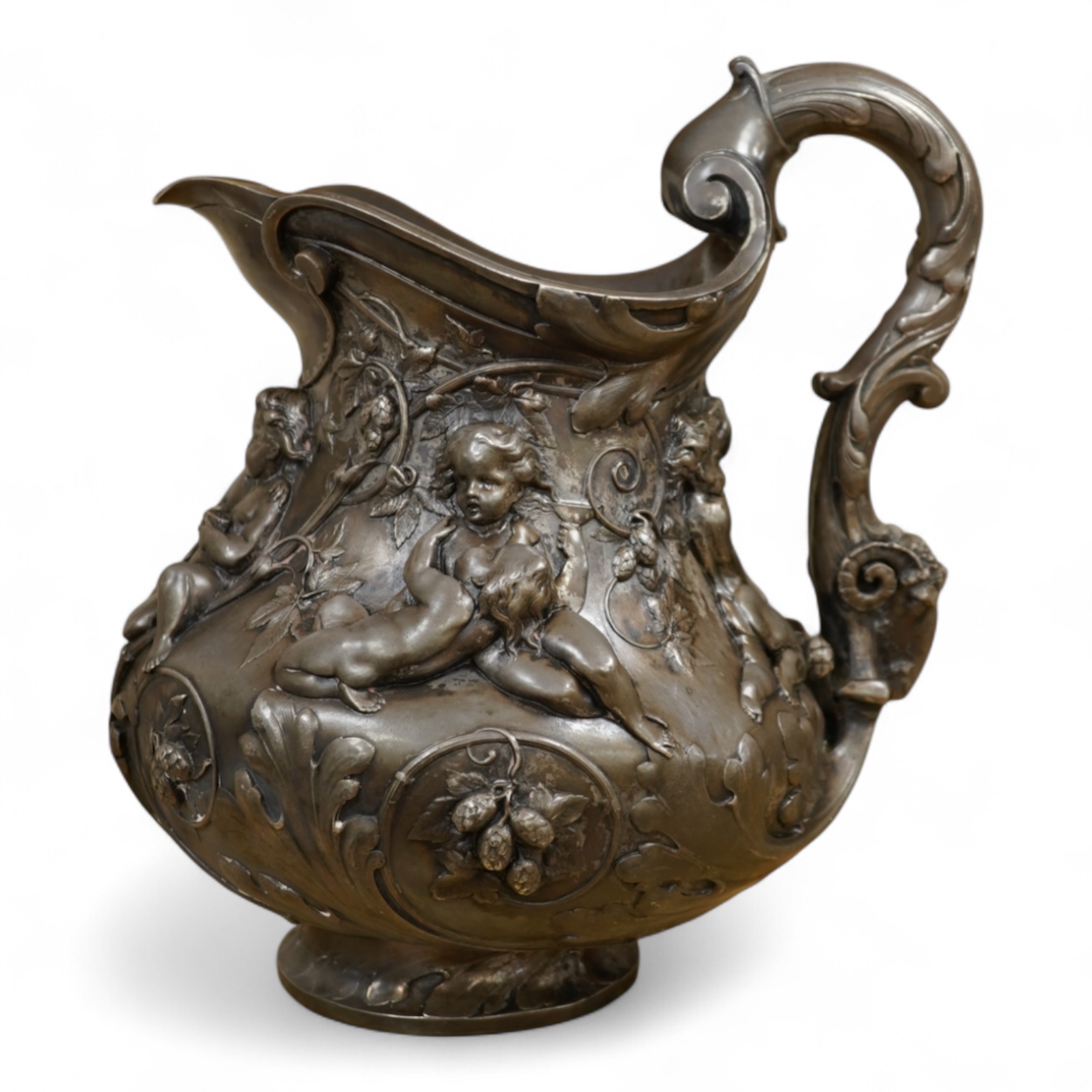 A large Victorian electrotype silver plated jug, in the manner of Elkington & Co., 28cm